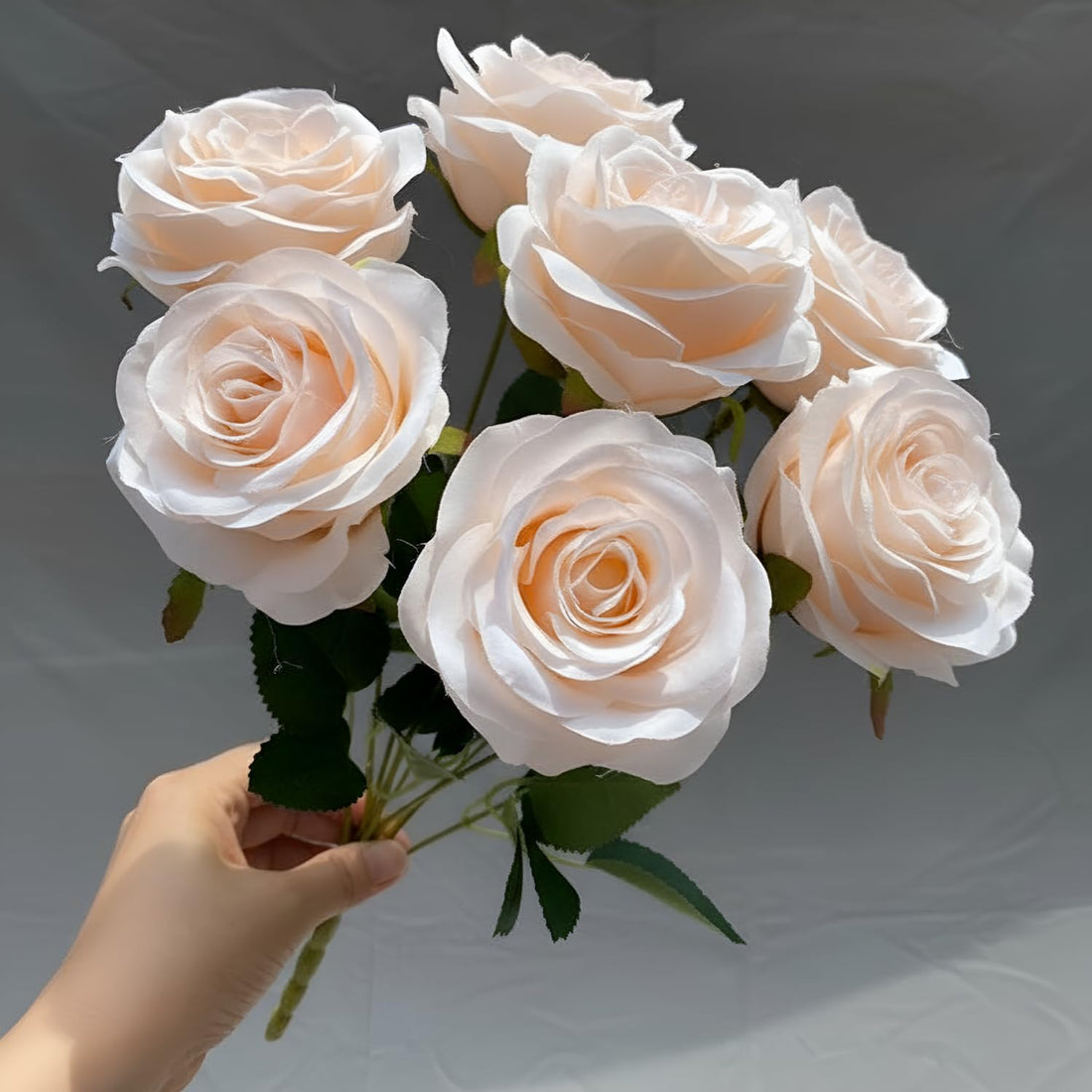 Artificial Rose Bouquet – 7 Soft Silk Roses With Green Leaves
