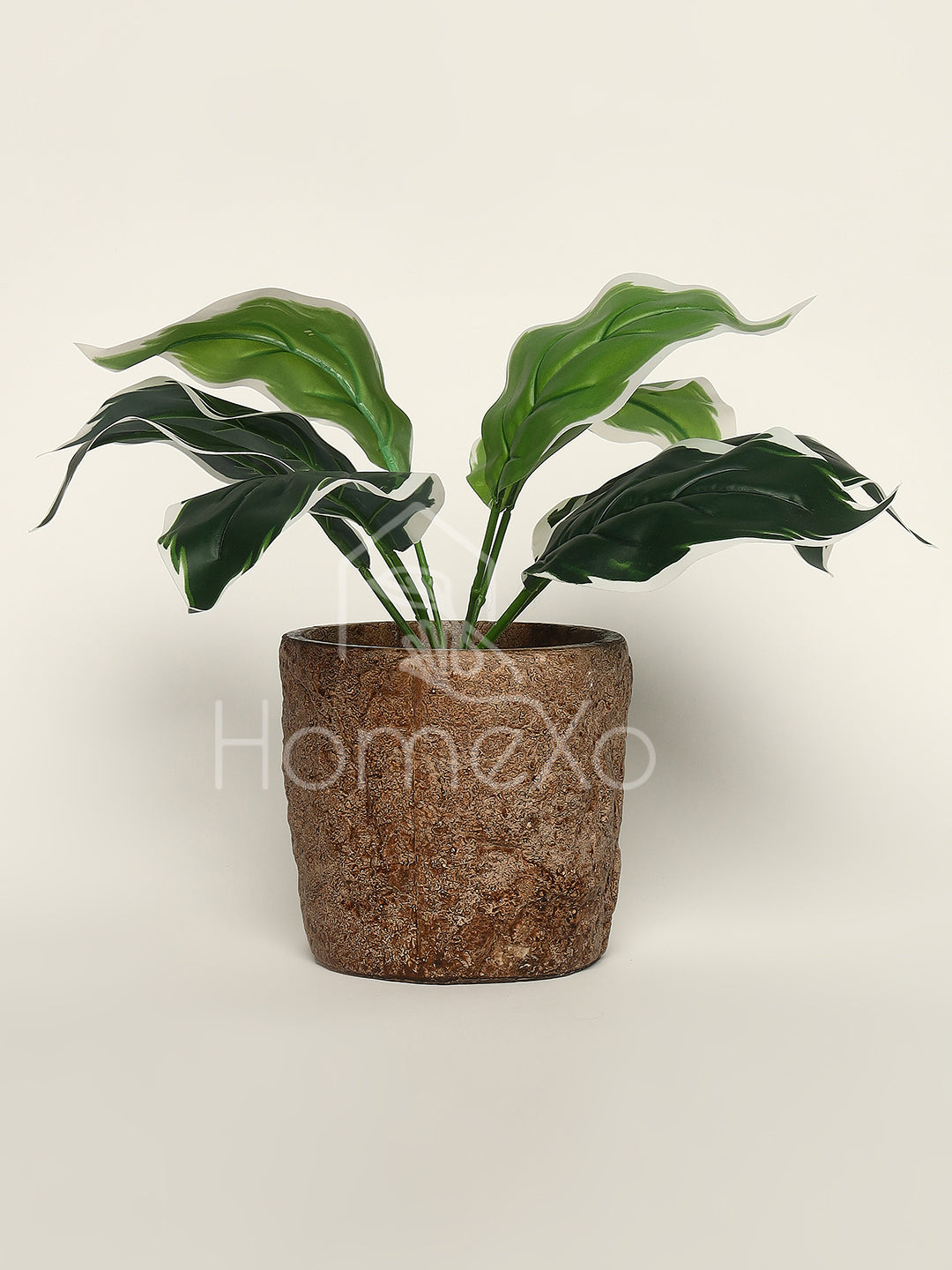 HomeXO "Artificial Stonepot Green Leaf Plant, Elevating Home Balcony and Garden Areas with Rustic Charm and Maintenance-Free Elegance